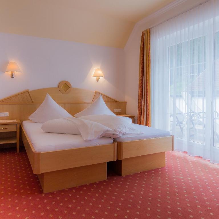 Hotel Garni Martina - Doppelzimmer mit Balkon - 1