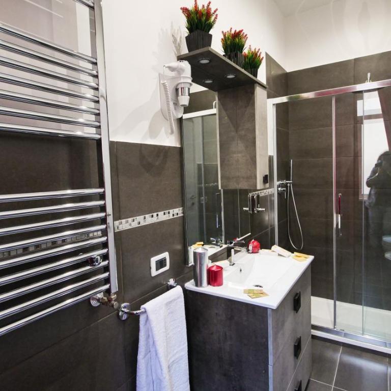 Home Suites Giolitti - Camera King Deluxe - 13