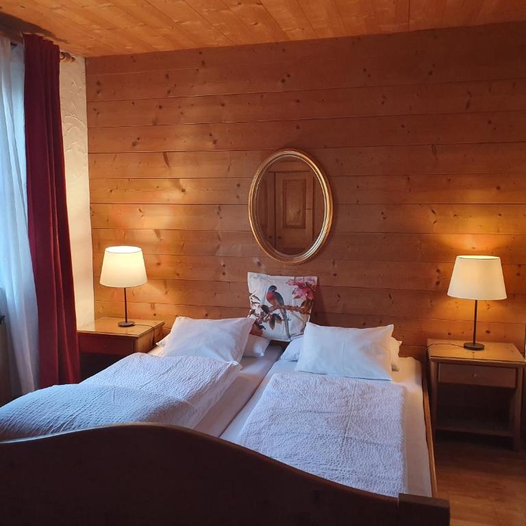 Appartement Pension Bäckenhäusl FERIENWOHNUNGEN Chalets Hütten Komfortzimmer - Comfort Vierbettzimmer - 23
