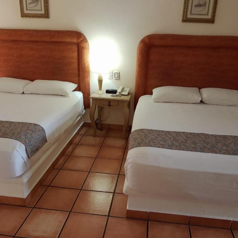 Suites Las Palmas - Habitación Doble con 2 camas grandes - 4