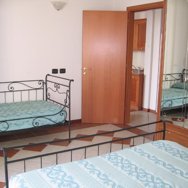 Residenza sul Mare Villa Margherita - Il Lupo Affitta - Appartamento con 2 Camere da Letto - 21