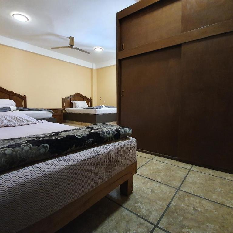 Hotel Colonos Los Cabos - Habitación Triple Estándar - 8