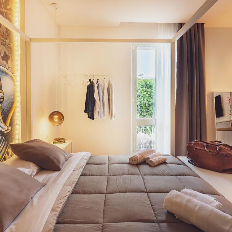 Marla's boutique rooms - Camera Tripla con Balcone - 10