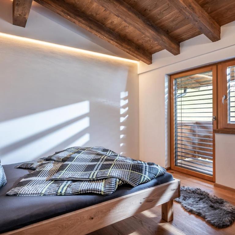 Alpenchalet "DAHOAM" - Apartment mit 3 Schlafzimmern - 6
