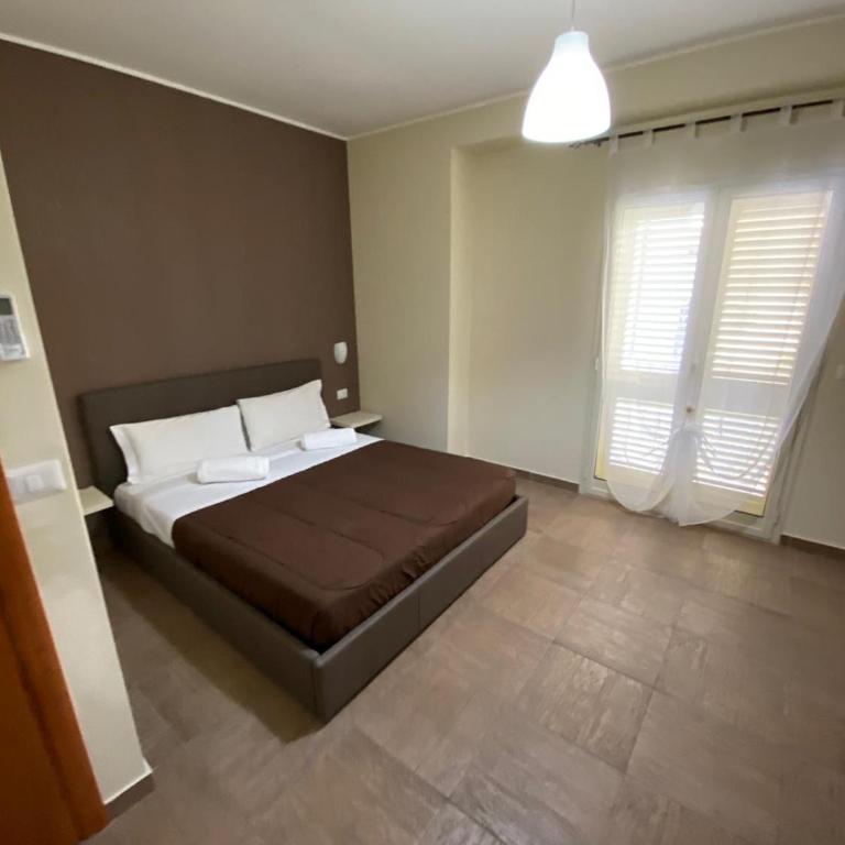 Nick & Santo's Holiday Homes - Camera Matrimoniale Deluxe con Balcone e Vista Mare - 10