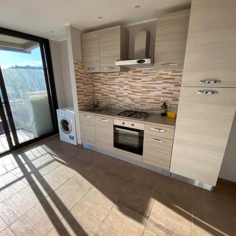 Nick & Santo's Holiday Homes - Camera Matrimoniale Deluxe con Balcone e Vista Mare - 1