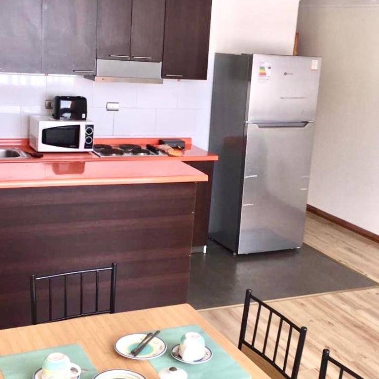 Departamento completo 70 mts2 (2 habs + 2 futones) - Centro Tomé - 6 personas max - Edificio Don Francisco - Two-Bedroom Apartment - 5