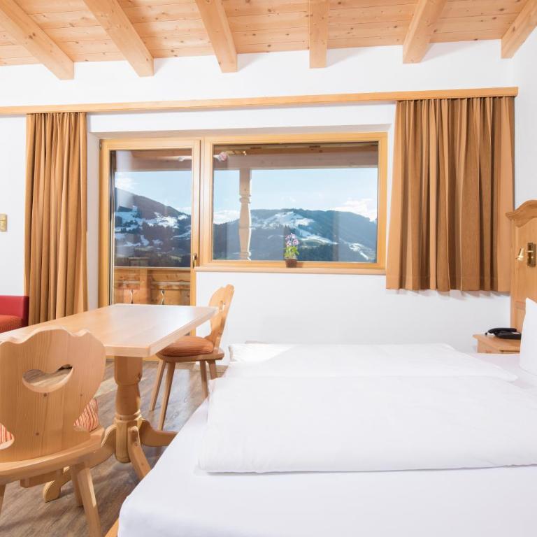 Hotel & Alpengasthof Pinzgerhof - Deluxe Dreibettzimmer mit Balkon - 7