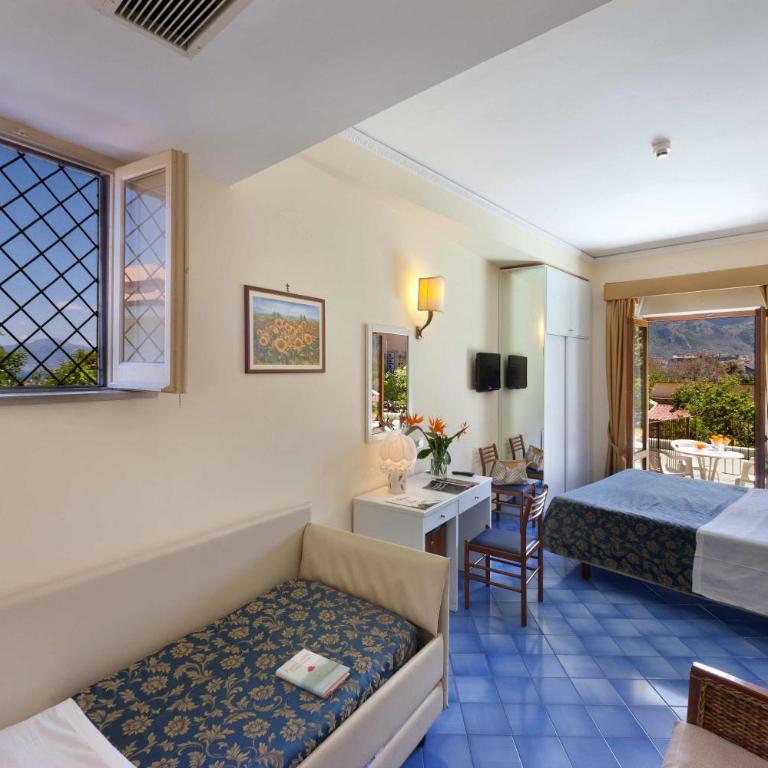 Hotel Girasole - Camera Quadrupla - 1