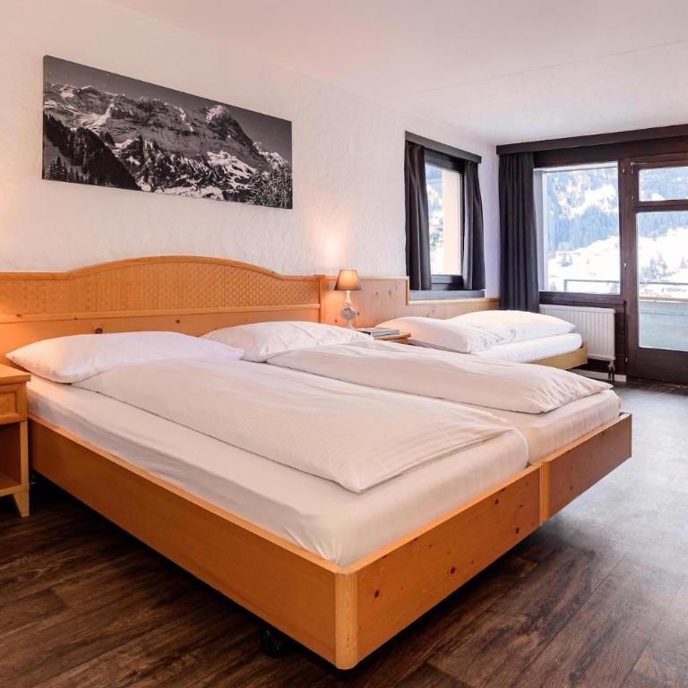 Jungfrau Lodge, Annex Crystal - Habitación Triple con balcón y vistas al Eiger - 8