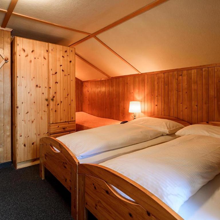 Jungfrau Lodge, Swiss Mountain Hotel - Vierbettzimmer mit eigenem Bad - 7