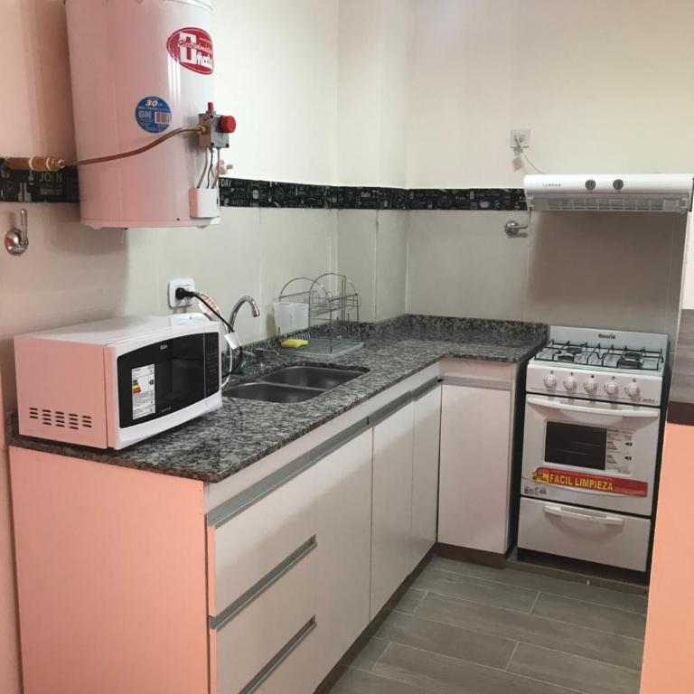 DEPARTAMENTO DE 2 DORMITORIOS C/ COCHERA - Apartamento de 2 dormitorios - 6