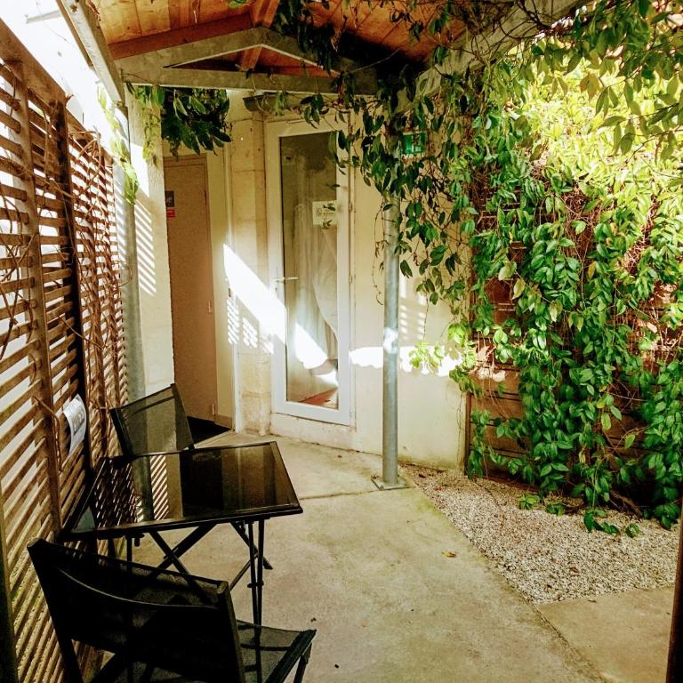 Accostage Hôtel Plage de la Concurrence - Chambre Double ou Lits Jumeaux avec Patio - 1