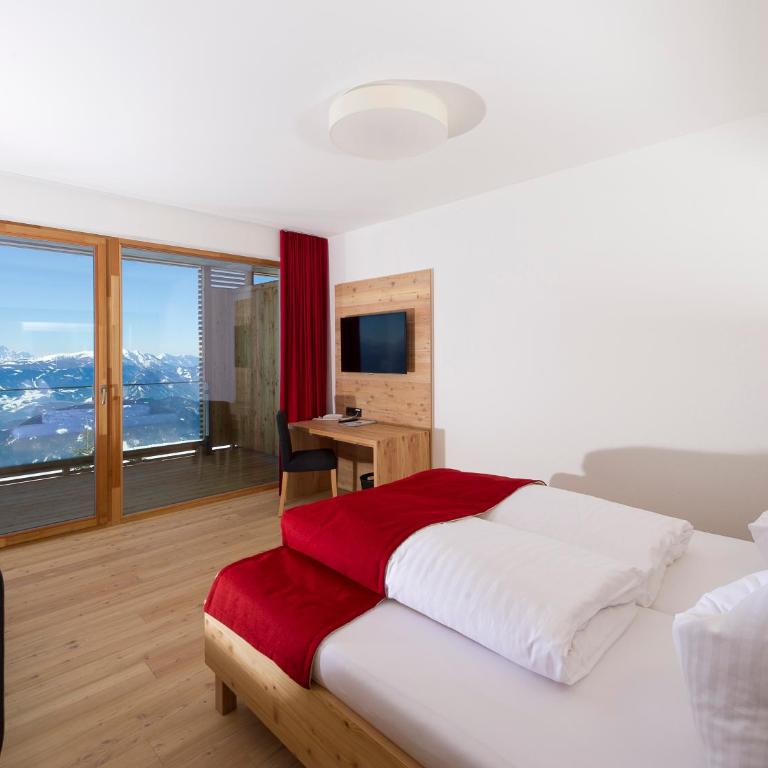Alpinhotel Pacheiner - Doppel-/Zweibettzimmer mit Bergblick - 4