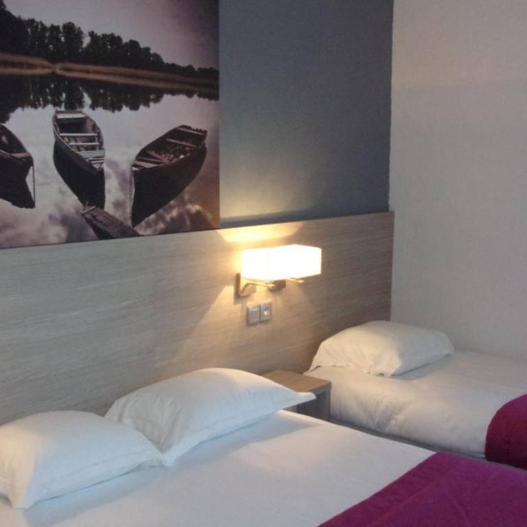 Atoll Hotel restaurant - Chambre Triple (1 Lit Double et 1 Lit Simple) - 6