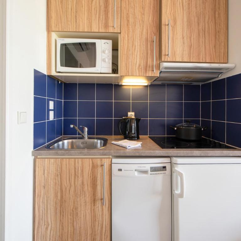 Résidence Pierre & Vacances Premium Port Prestige - Appartement 1 Chambre avec Baignoire Spa, Climatisation et Terrasse (4 Personnes) - Vue sur Port - 4