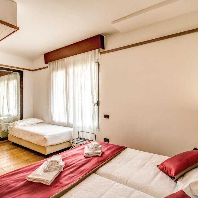 Ginevra Palace Hotel - Camera Tripla Standard - 2