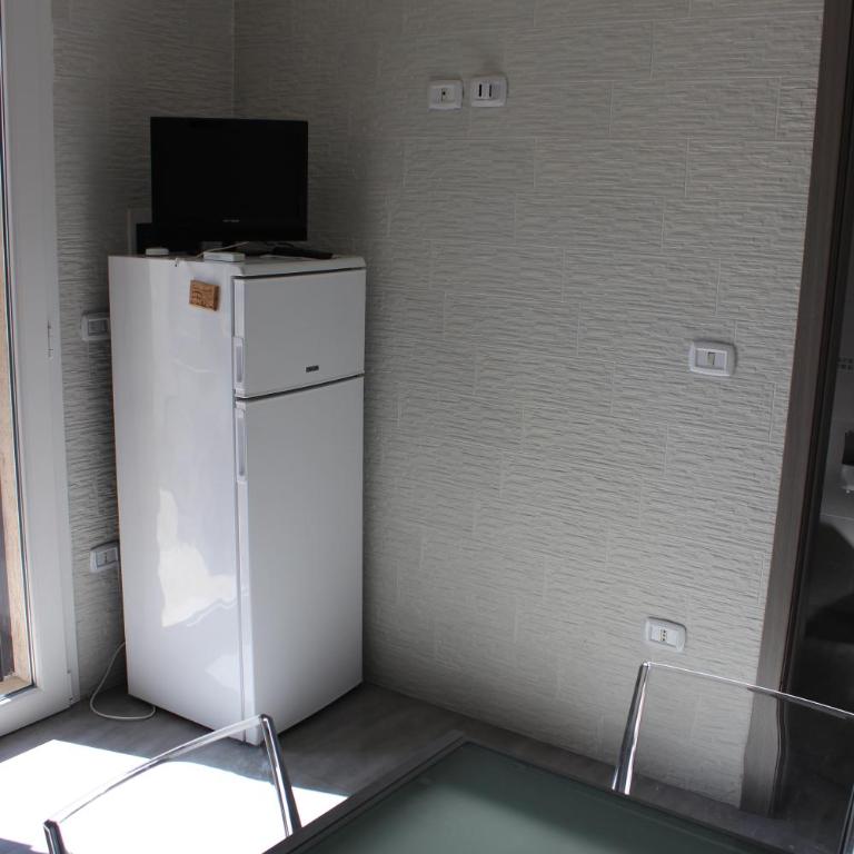 "SUPER" a Torre Lapillo al primo piano a 50 dal centro a 150 mt dalla spiaggia , disponibile NAVETTA per l'aereoporto GRATUITA - Appartamento - Piano Terra - 13