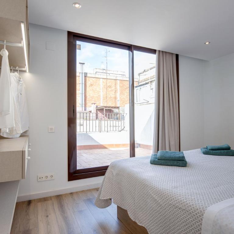 LucasLand Apartments Barcelona - Apartamento Ático - 9