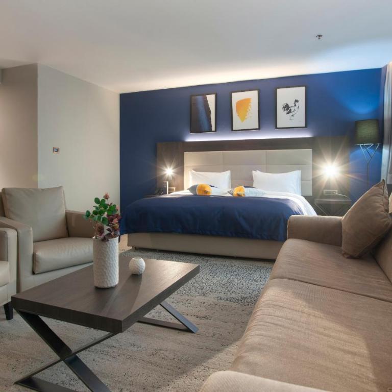 voco - Podgorica by IHG - One-Bedroom King Suite with Single Sofa Bed - 1
