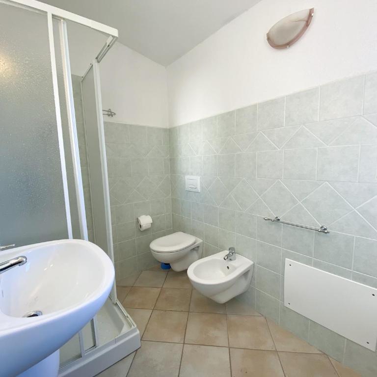 Appartamento Residenziale Trilocale 4 posti letto via Loiri - Two-Bedroom House - 19