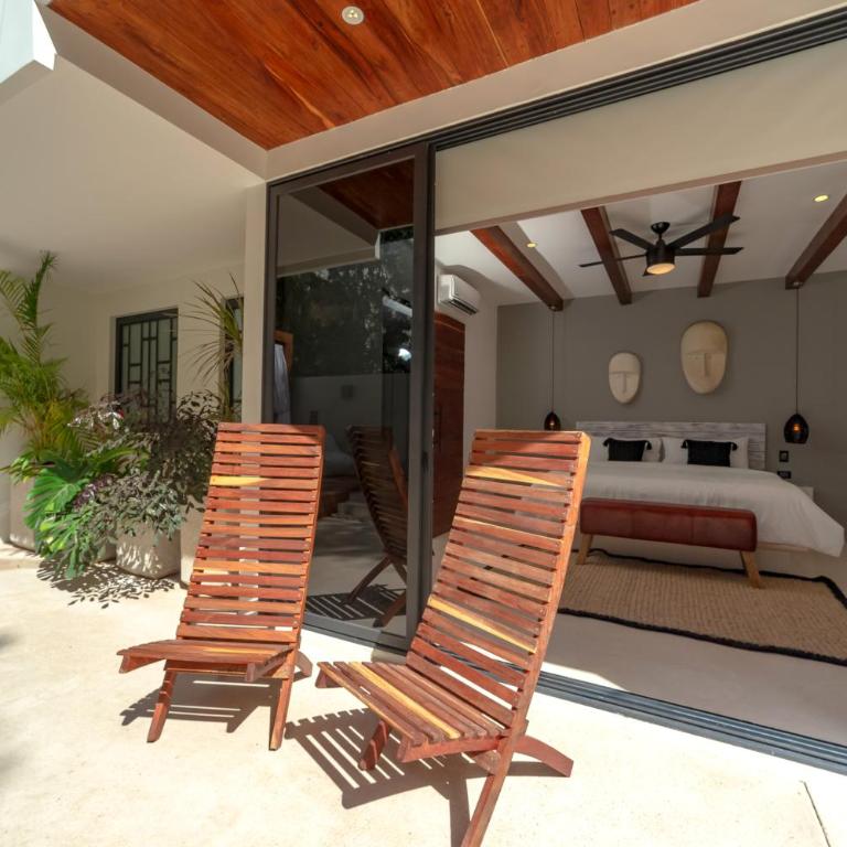 BT Rooms Tulum - Habitación con cama extragrande y vistas a la piscina - 13