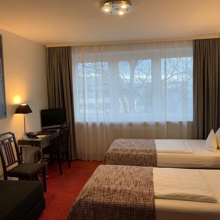 Hotel Nymphenburg City - München - Doppelzimmer - 11