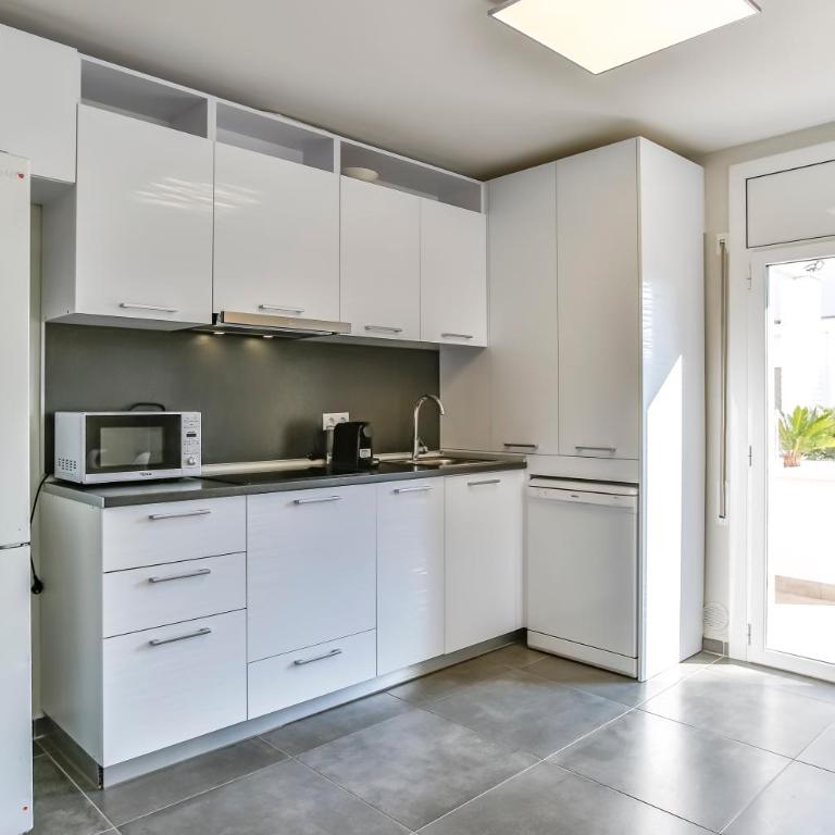 Vacaciones Perfectas en la Playa Calafell - Casa de 4 dormitorios - 12