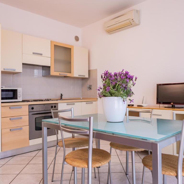 Baia Blu RTA Residence - Appartamento con Vista Giardino - 1