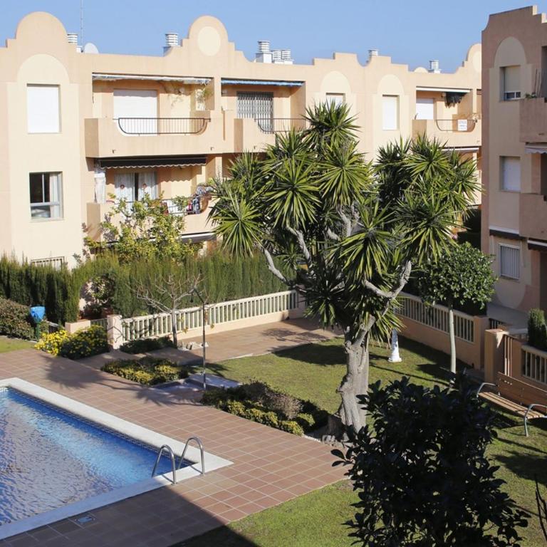 AT015 Piscina y aparcamiento, a 7 min de la playa La Paella - Three-Bedroom Apartment - 1