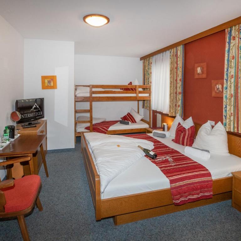 Hotel Untermetzger - Comfort Vierbettzimmer - 8
