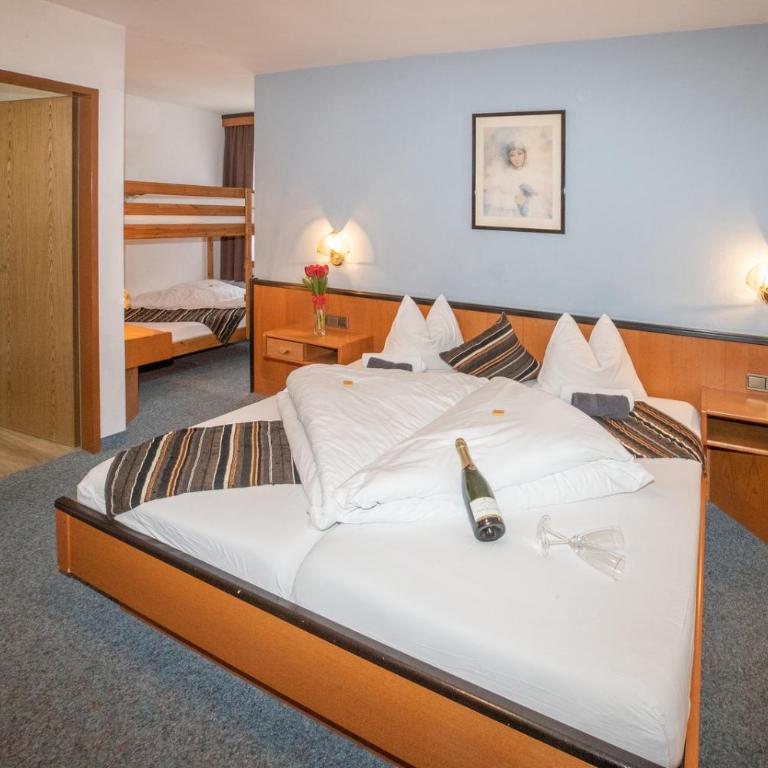 Hotel Untermetzger - Comfort Vierbettzimmer - 7