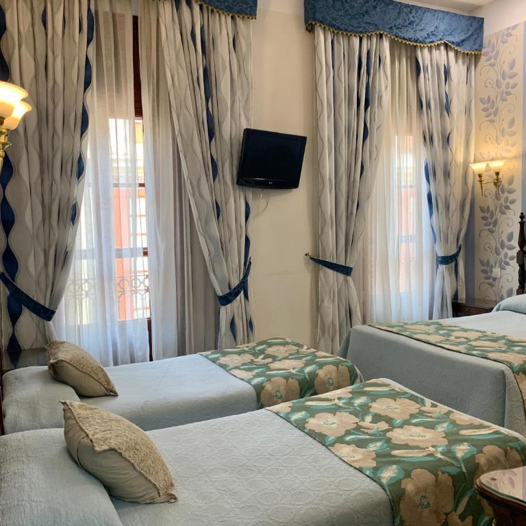 Hotel Europa Boutique Sevilla - Habitación cuádruple - 9