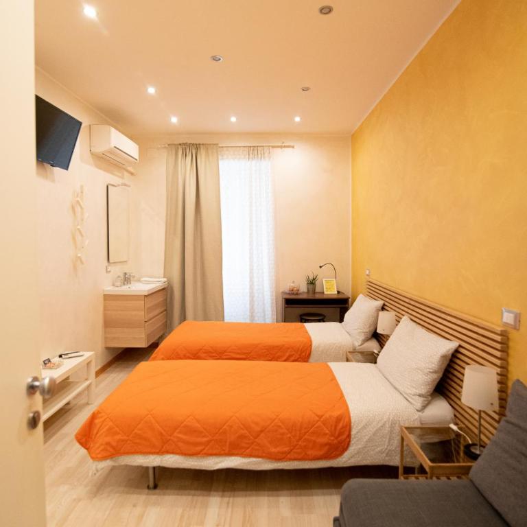 Area39 - Camera Matrimoniale/Doppia con Letti Singoli con Bagno Privato Esterno - 2