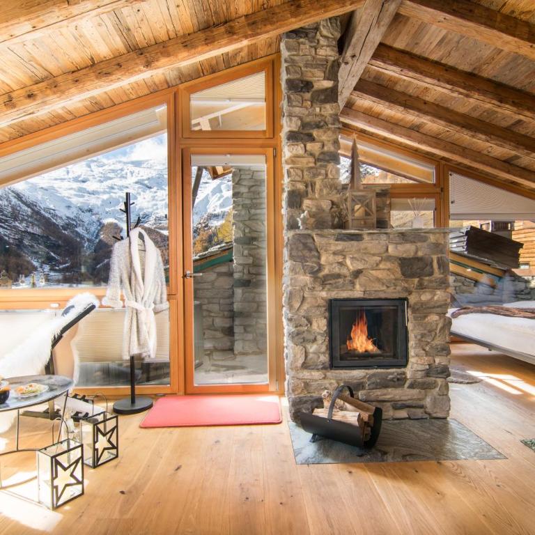 Boutique Lodge Spycher - Deluxe Suite mit Whirlpool-Badewanne im Freien und Sauna - 1