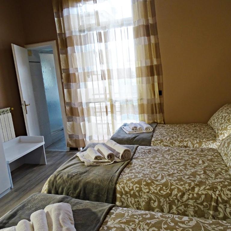 Affittacamere Arancio - Camera Matrimoniale con Letto Supplementare - 4