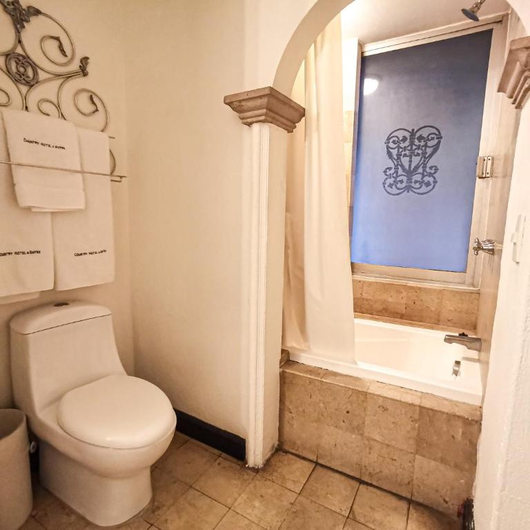 Country Hotel & Suites - Suite - 11