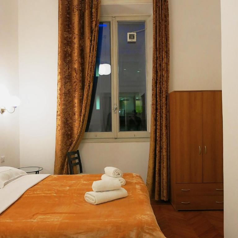 NIK Rooms - Petite Chambre Double ou Lits Jumeaux - 9