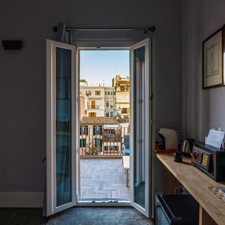 President Gardens - Camera Familiare con Balcone - 13