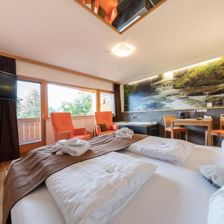 Almfrieden Hotel & Romantikchalet - Deluxe Doppelzimmer mit Bad - 4