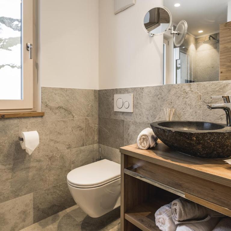 Aurela Mountain Chalets - Apartment mit Terrasse - 1