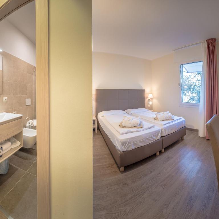 Hotel Capo Reamol - Camera Economy Doppia con Letti Singoli - 4