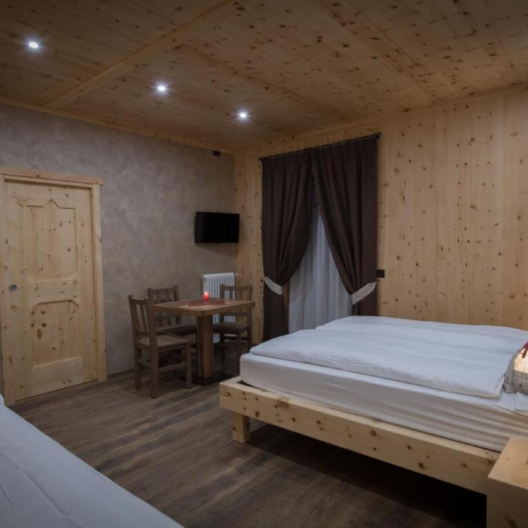 Chalet La Rugiada - Camera Tripla Comfort - 1