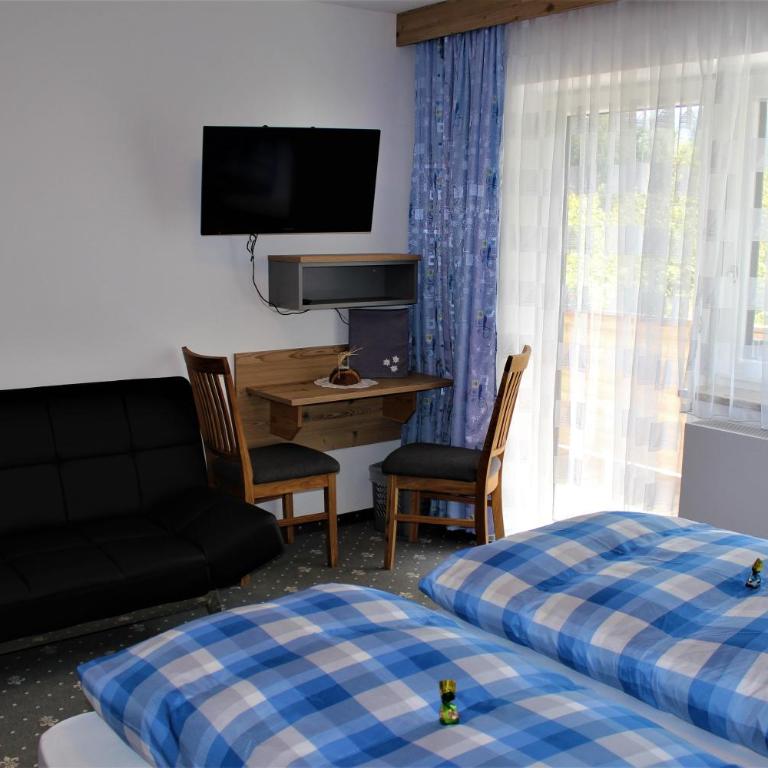 Gästehaus Oberauer - Doppelzimmer mit eigenem Bad - 4