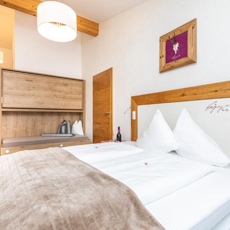 Enjoy The Alps - Aparthotel - Apartment mit 3 Schlafzimmern - 43