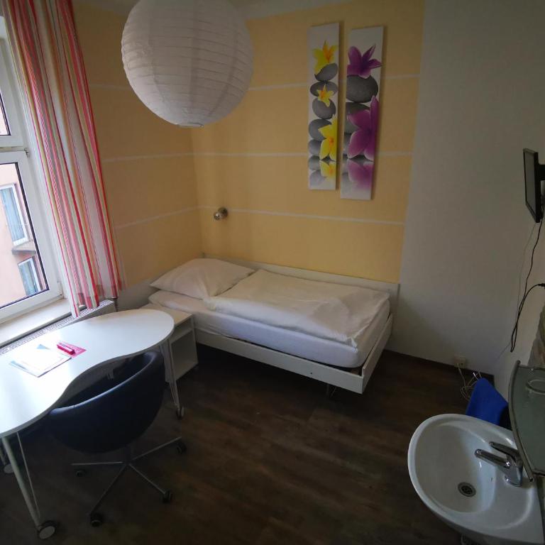 City Hostel - Einzelzimmer mit Gemeinschaftsdusche und -WC - 2