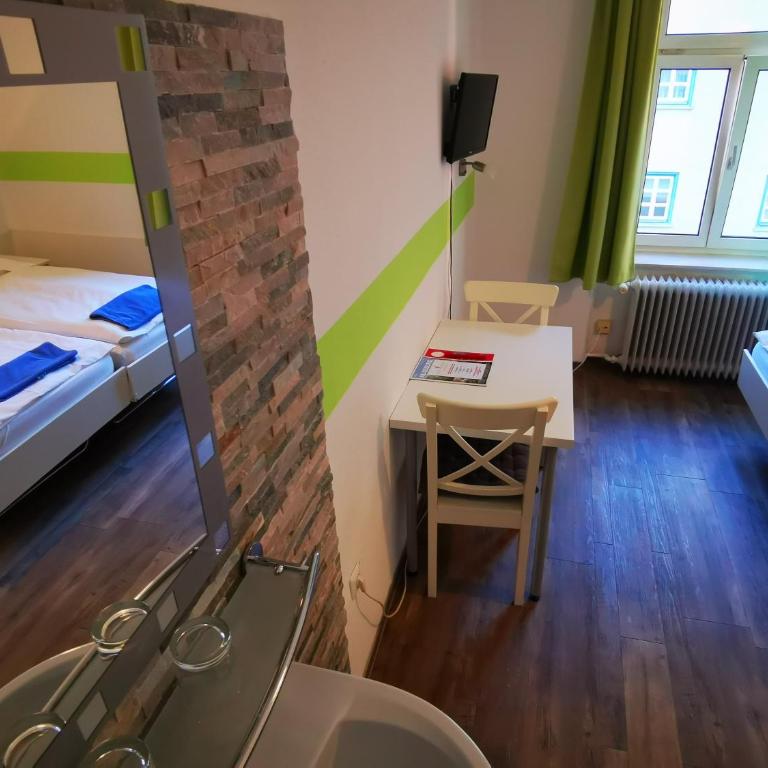City Hostel - Doppelzimmer mit Gemeinschaftsbad - 1
