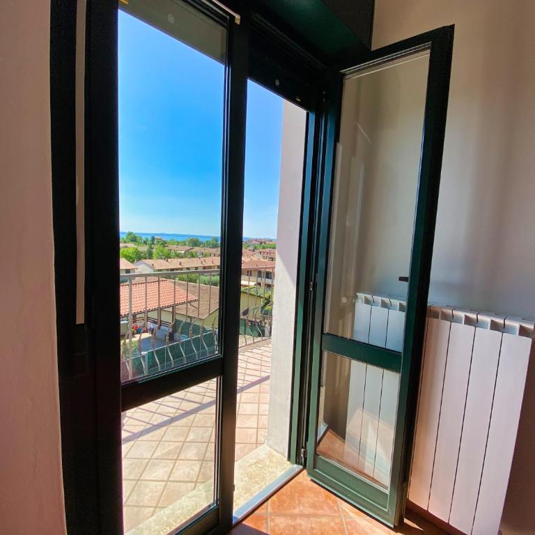 Residence Bellavista - Appartamento con 1 Camera da Letto, Balcone e Vista Lago - Lato Strada - 10