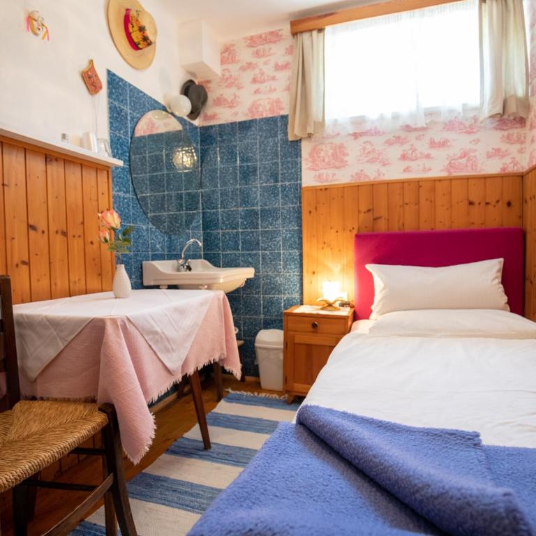 Gästehaus Pension Ria - Einzelzimmer mit Gemeinschaftsbad - Untergeschoss - 4