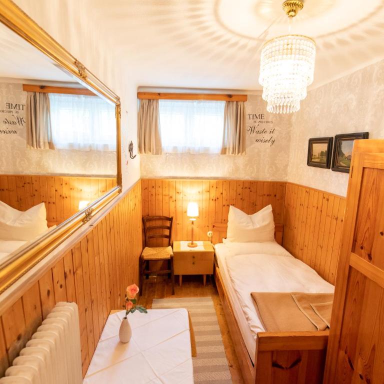 Gästehaus Pension Ria - Einzelzimmer mit Gemeinschaftsbad - Untergeschoss - 2